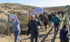 Demonstrators protest against sand mining operations in Marina, California, in January 2017.
